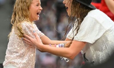Taylor Swift's Priceless Reaction Goes Viral When Young Swiftie '22 Hat Recipient Danced Just as Vigorously as the Backup Dancers at the Hamburg Eras Tour... Watch now