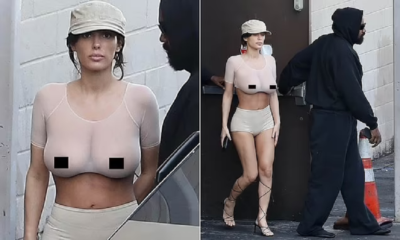 Bianca Censori exposes her bare breasts AGAIN in shocking sheer top at the cinema with Kanye West - as somber couple leave theater early via the back exit