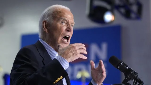 Biden, 81, glares into the teleprompter and almost makes disastrous slip-up during NATO speech to world leaders trying to prove he is fit to serve