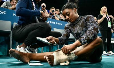 Breaking News; Gymnastics Simone Biles Was rushed out of the field after having a critcal Injury today. Her Coach was slamed For Calling Her This... full story below