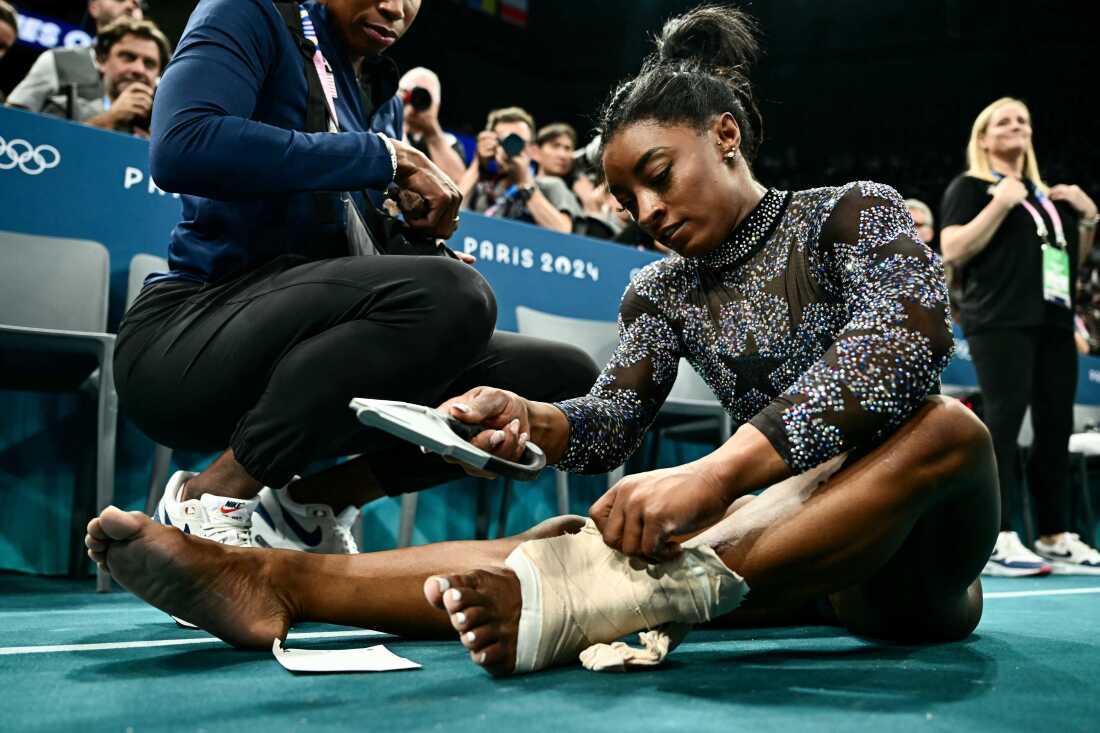 Breaking News; Gymnastics Simone Biles Was rushed out of the field after having a critcal Injury today. Her Coach was slamed For Calling Her This... full story below